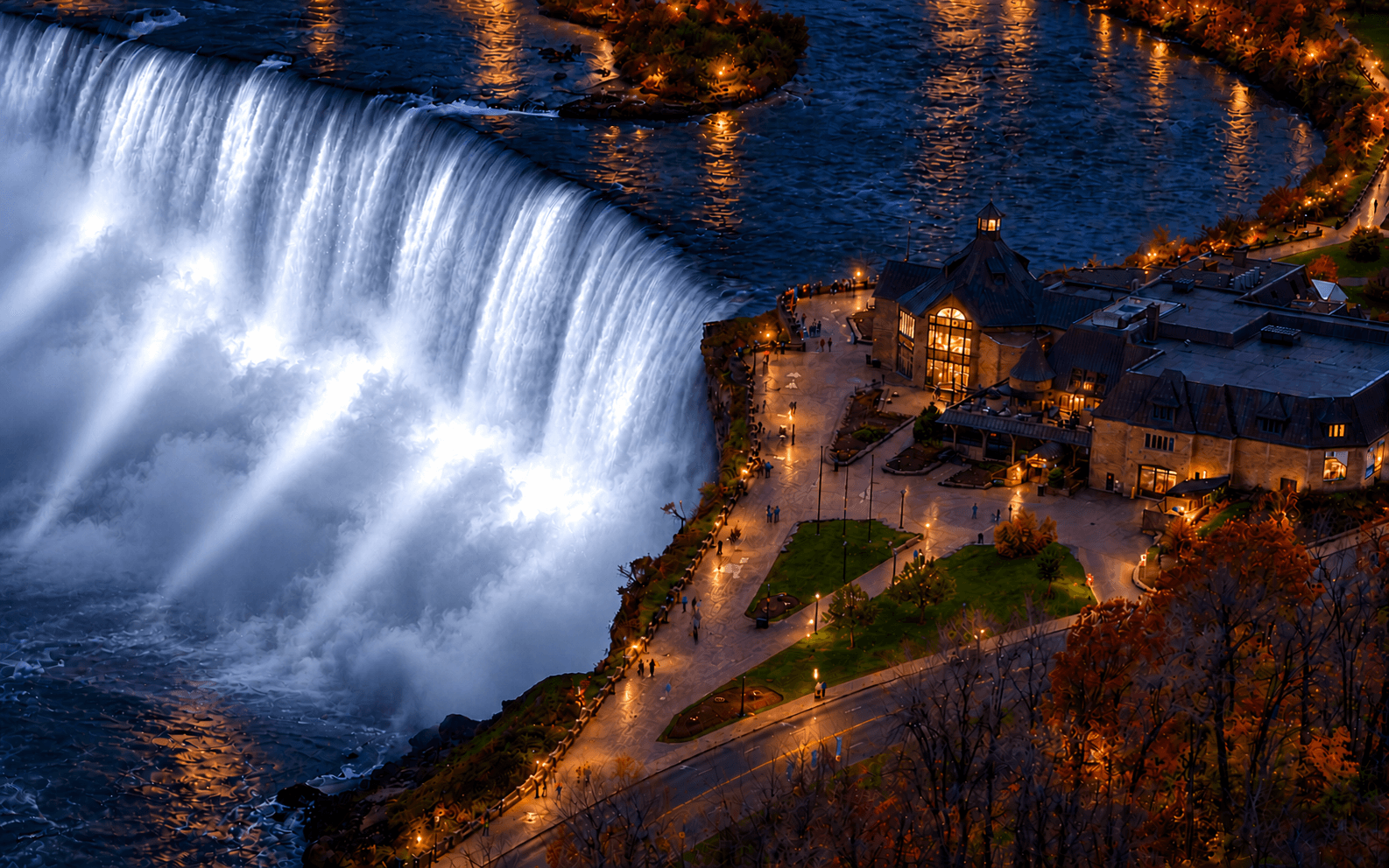 Imagined nighttime view of Niagara Falls with animated colourful illumination over the water